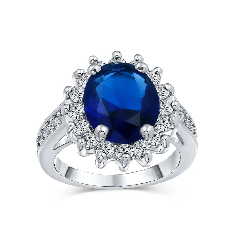 engagement-emerald-halo-rings-Classic 5CTW Royal Blue CZ Halo Oval Simulated Sapphire Engagement Ring Silver