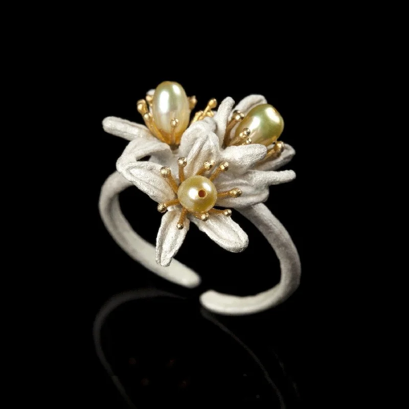 ladies-infinity-platinum-rings-Orange Blossom Ring - Triple Flower