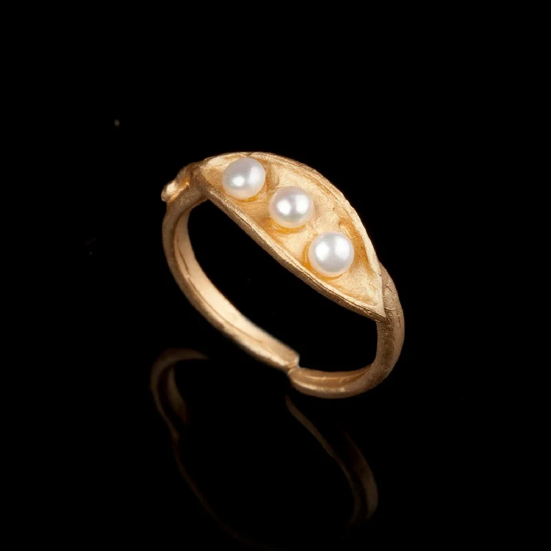 ladies-pear-cut-platinum-rings-Pea Pod Triple Pearl - Ring