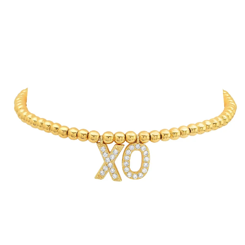 Ladies bracelets sleek charm -XO STRECH BRACELET GOLD